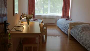 Фото номера Трехместный номер с общей ванной комнатой Гостевой дом Sõrve Guest House г. Сальме 6
