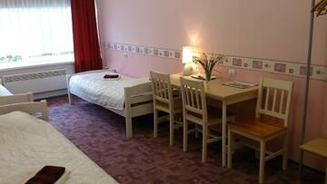 Фото номера Трехместный номер с общей ванной комнатой Гостевой дом Sõrve Guest House г. Сальме 7